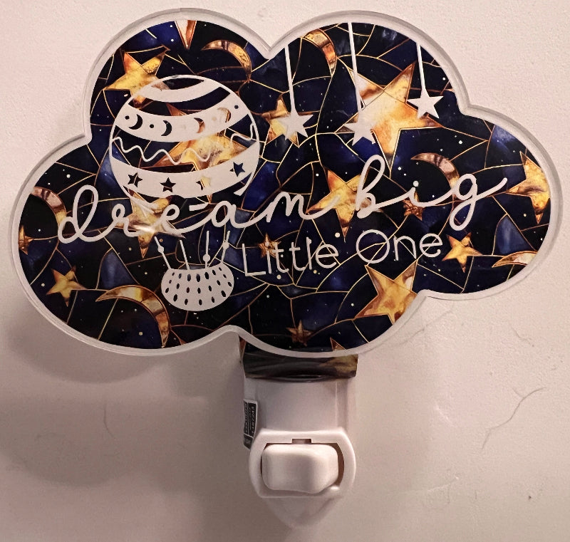 Handcrafted acrylic nightlight with a moon and stars design, featuring the phrase 'Dream Big Little One'. From She Shed Designs.