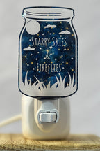 Decorative night light with 'Starry Skies & Fireflies' on a starry night background.
From She Shed Designs.