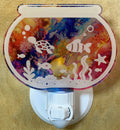 Decorative night light with fishbowl design. From She Shed Designs.