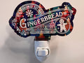 Handcrafted acrylic nightlight with a gingerbread bakery theme, featuring an engraved design and a LED bulb, on a white background. From She Shed Designs.