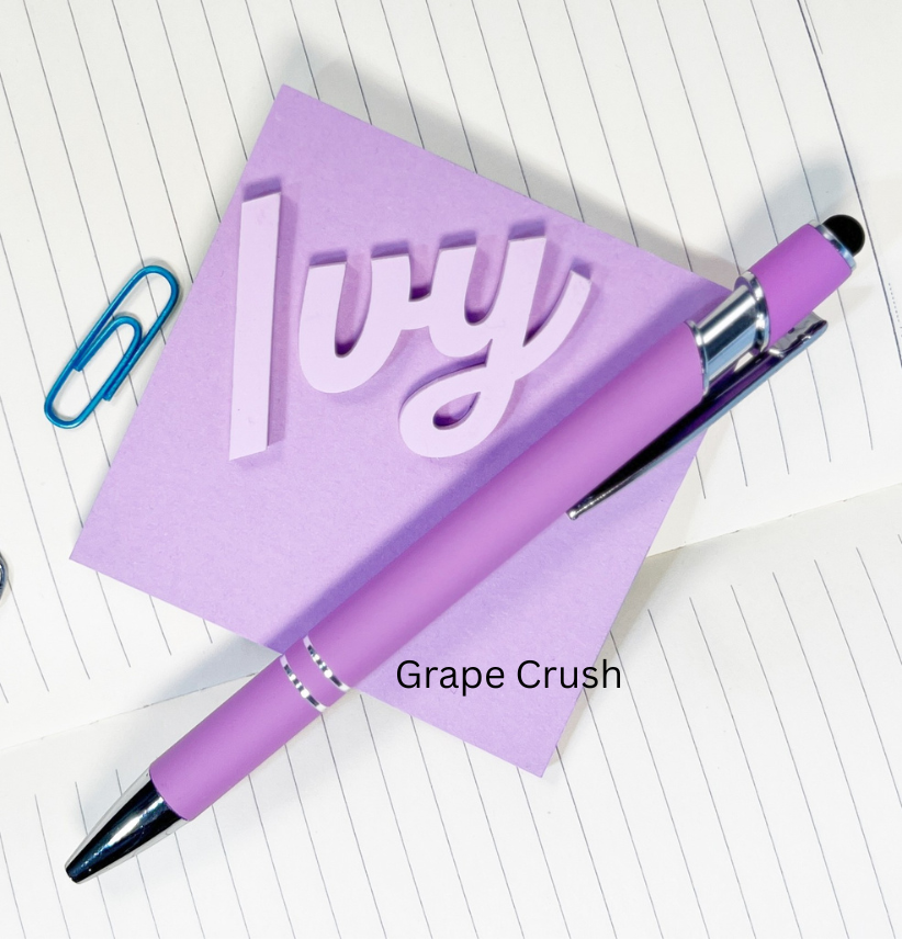 Purple pen and notebook with 'Ivy' branding on a white background. From She Shed Designs