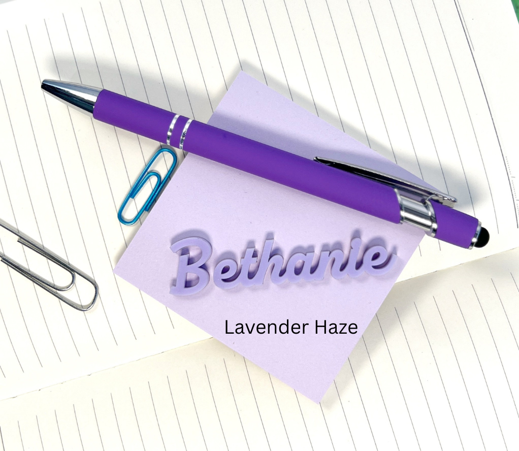Purple pen and sticky note with 'Bethanie' on a lined paper background. From She Shed Designs