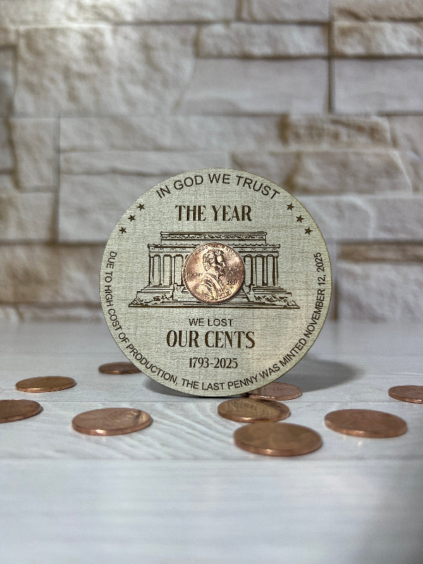 Circular Magnet with penny on linen patterned wood. From She Shed Designs