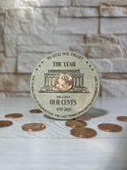 Circular Magnet with penny on linen patterned wood. From She Shed Designs