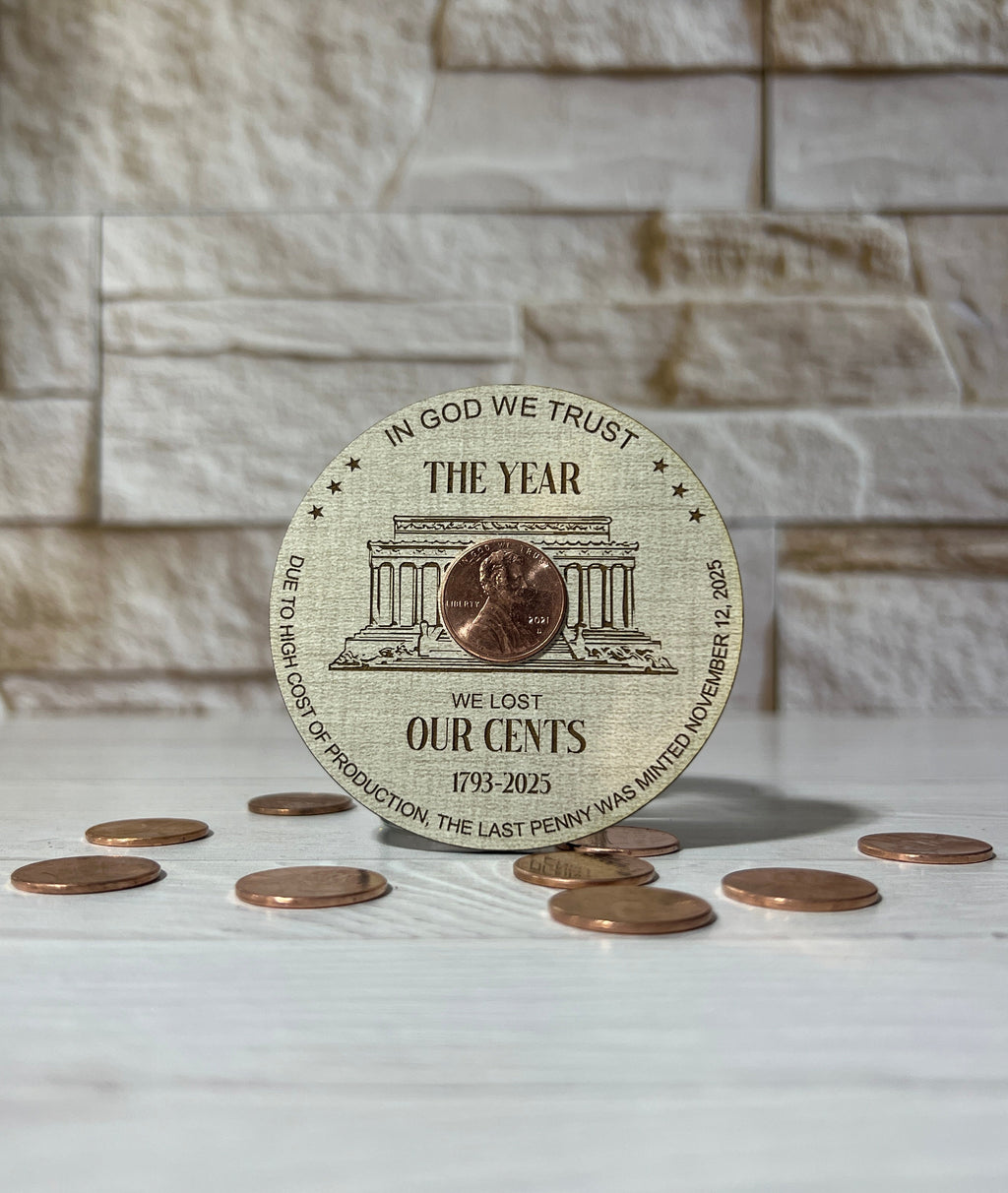 Circular Magnet with penny on linen patterned wood. From She Shed Designs