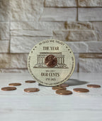 Circular Magnet with penny on linen patterned wood. From She Shed Designs