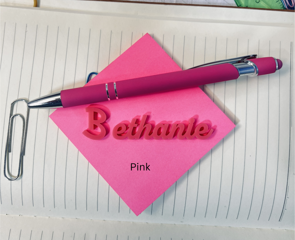 Pink pen and sticky note with 'Bethanie' on a lined paper background. From She Shed Designs