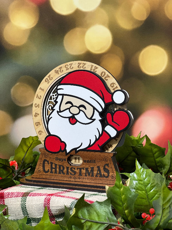 Christmas-themed Advent calendar stand with Santa Claus design on a festive background. From She Shed Designs